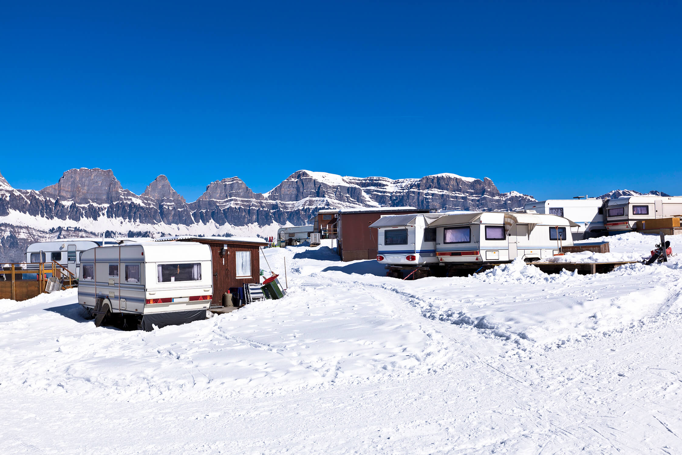 "camping caravans in the snow, swiss alps."